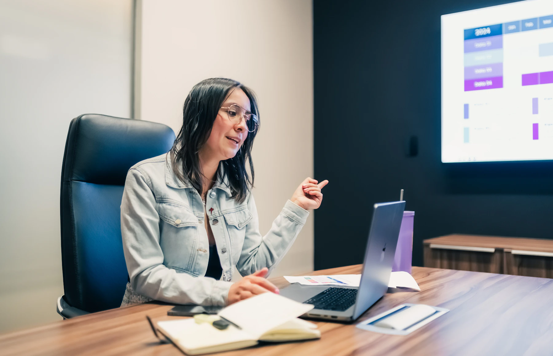 Strategy meeting with analytics and laptop screens for a premium website project